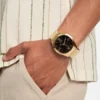 Gold-Tone and Black Analog Watch